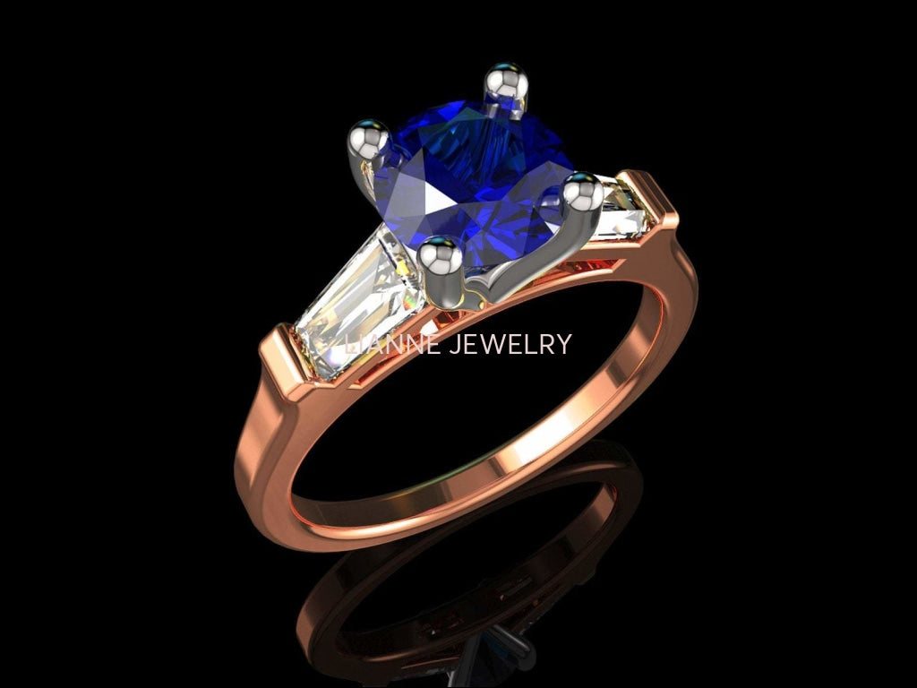 2 Tone 14K Rose gold 3 Stone Ring Lab Sapphire 7mm Round Extra Fine Royal Blue Flanked with Moissanite Tapered Baguettes - Lianne Jewelry